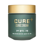 Green jar of Cure Cream with gold lid on a white background