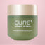 Green jar of Cure Intensive 2X Cream 50g on a pink background