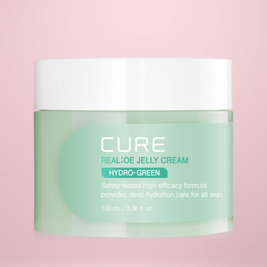 Jar of Cure Realoe Jelly Cream Hydro-Green 100ml on a pink background